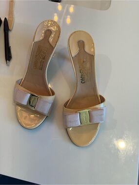 Salvatore Ferragamo Cream Patent Bow Slide Sandals with Gold Hardware